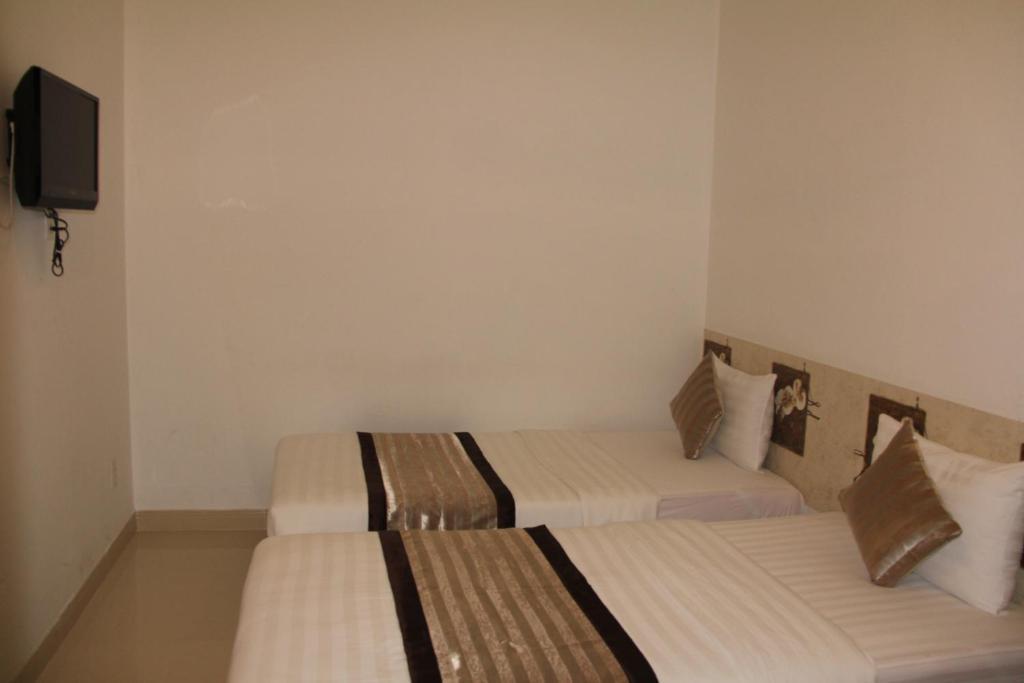 New Sunny Hotel Ho Şi Min Oda fotoğraf